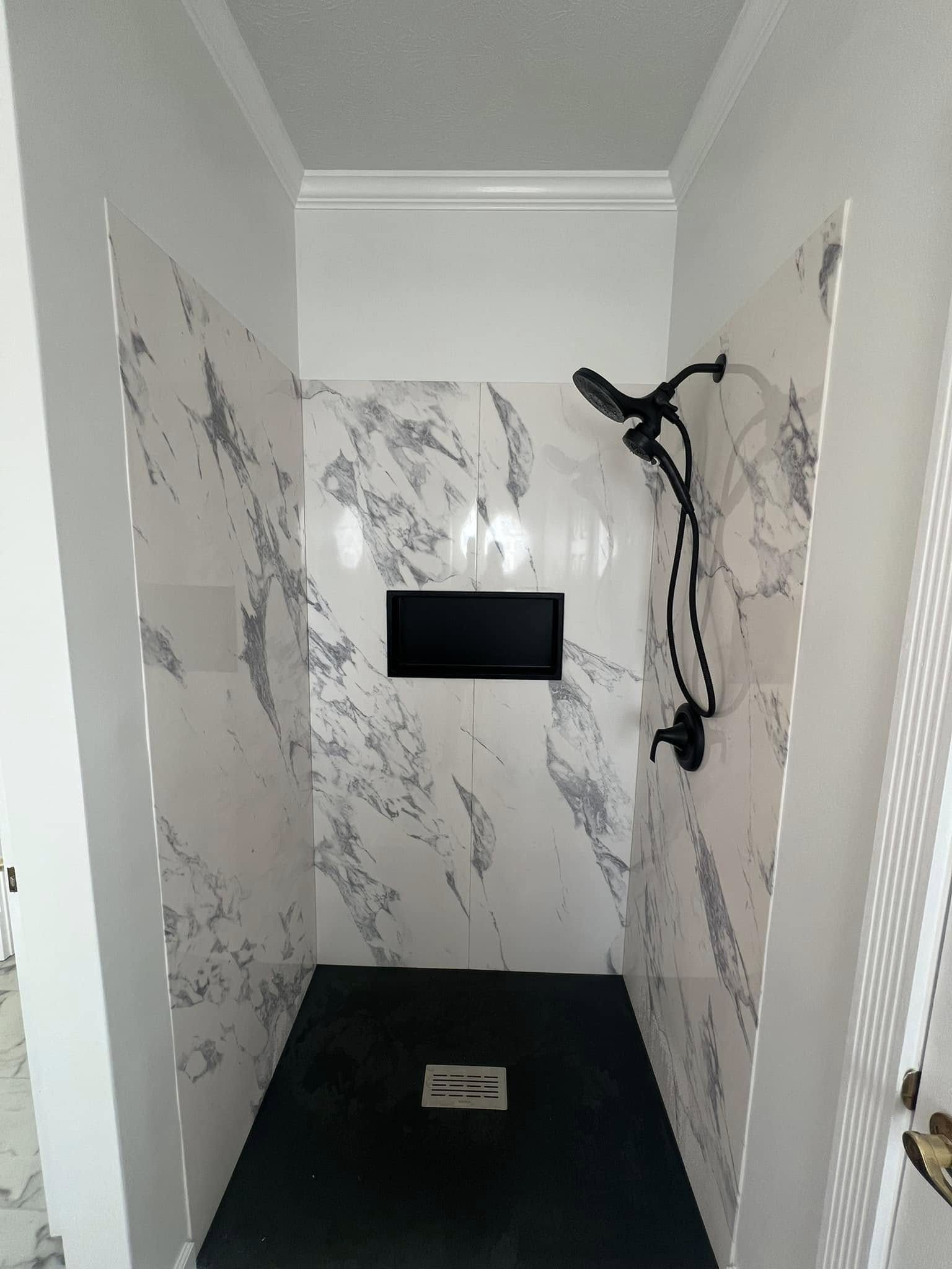 Completed bathroom remodel by Mid City Home Restoration, Western New York