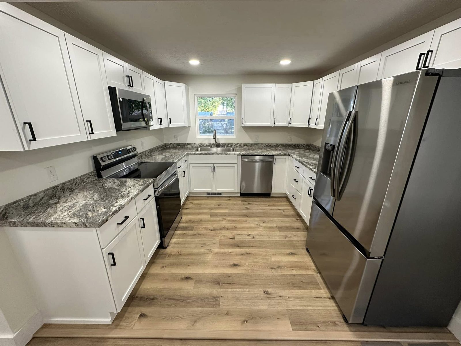 Completed kitchen renovation by Mid City Home Restoration, Western New York